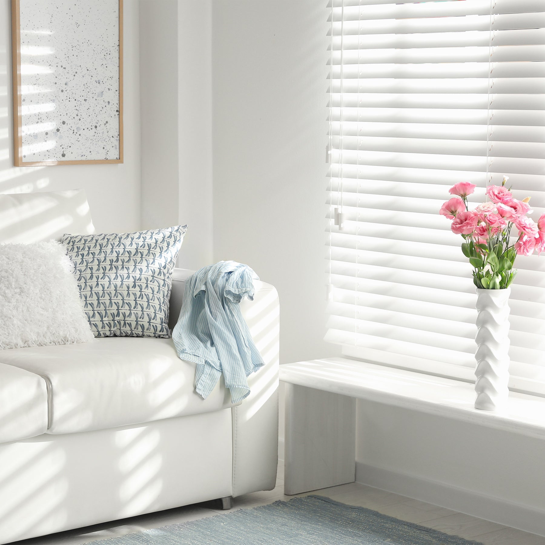 white mini blinds for indoor windows providing a refreshing ambiance