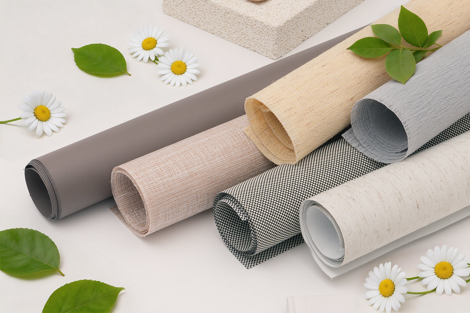 hestia roller shade fabrics, rolled-up shades display premium fabric textures, highlighting elegance and modern craftsmanship.