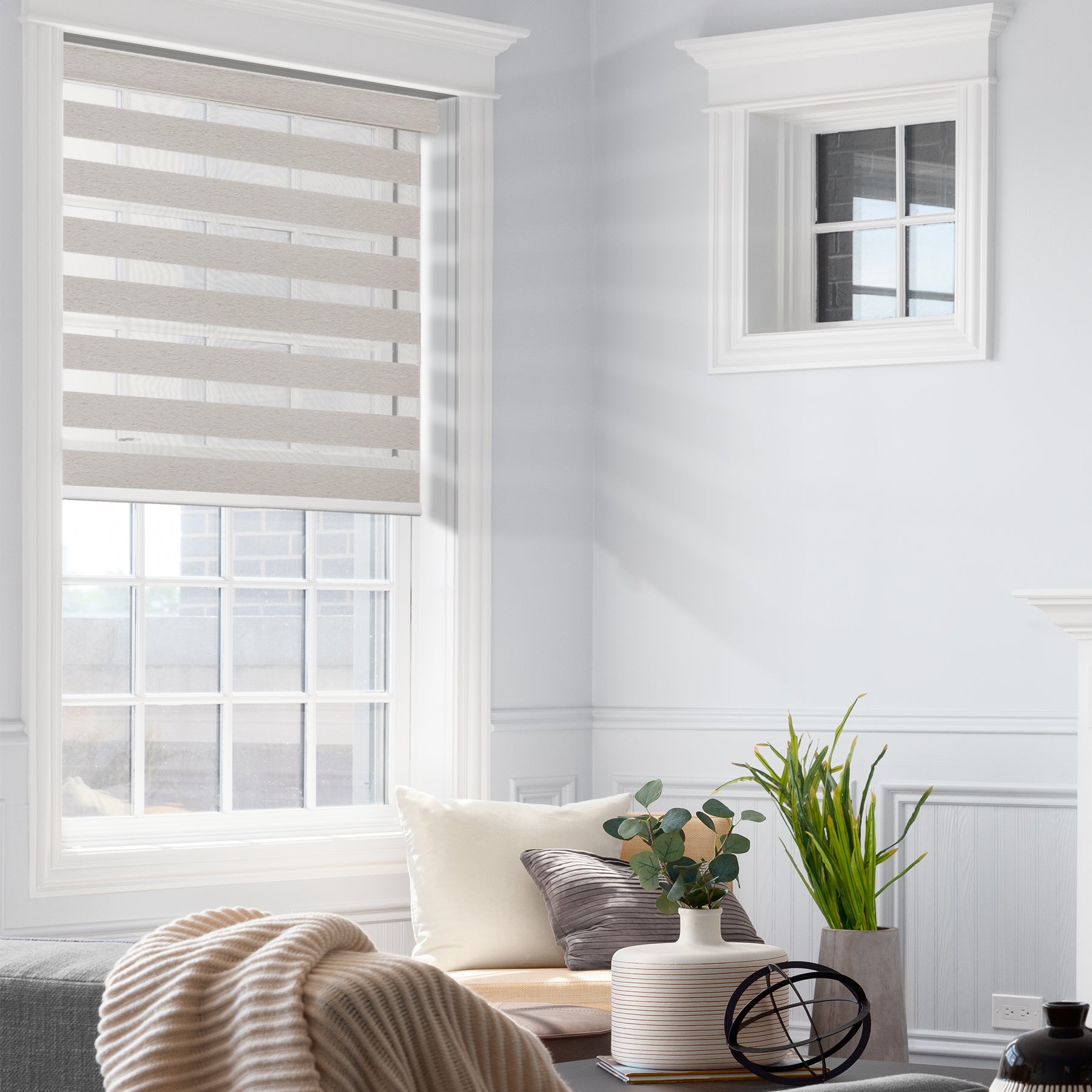 motorized light filtering linen-like bathroom zebra shades in a living room