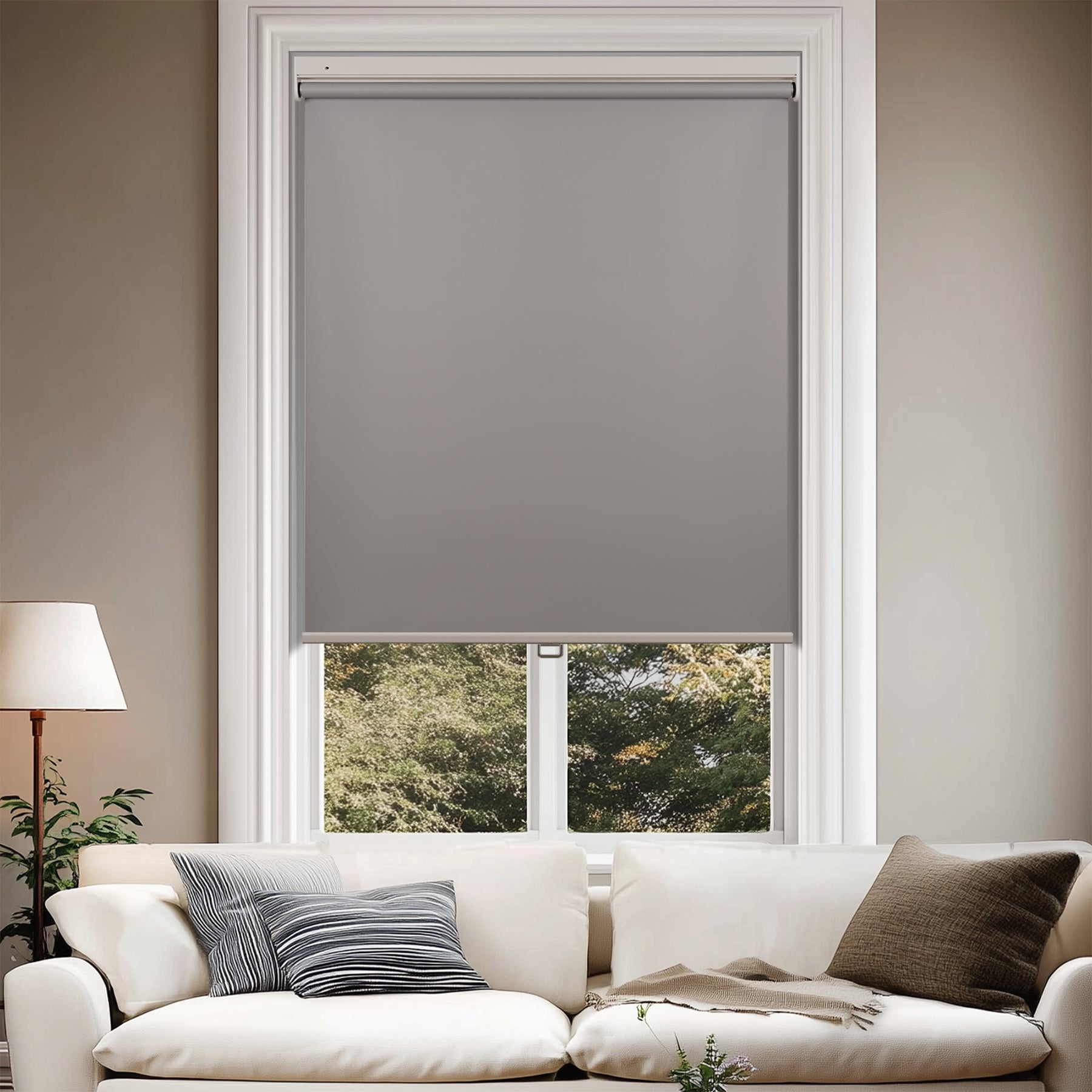 no-drill blackout waterproof insulated roller shades in a living room