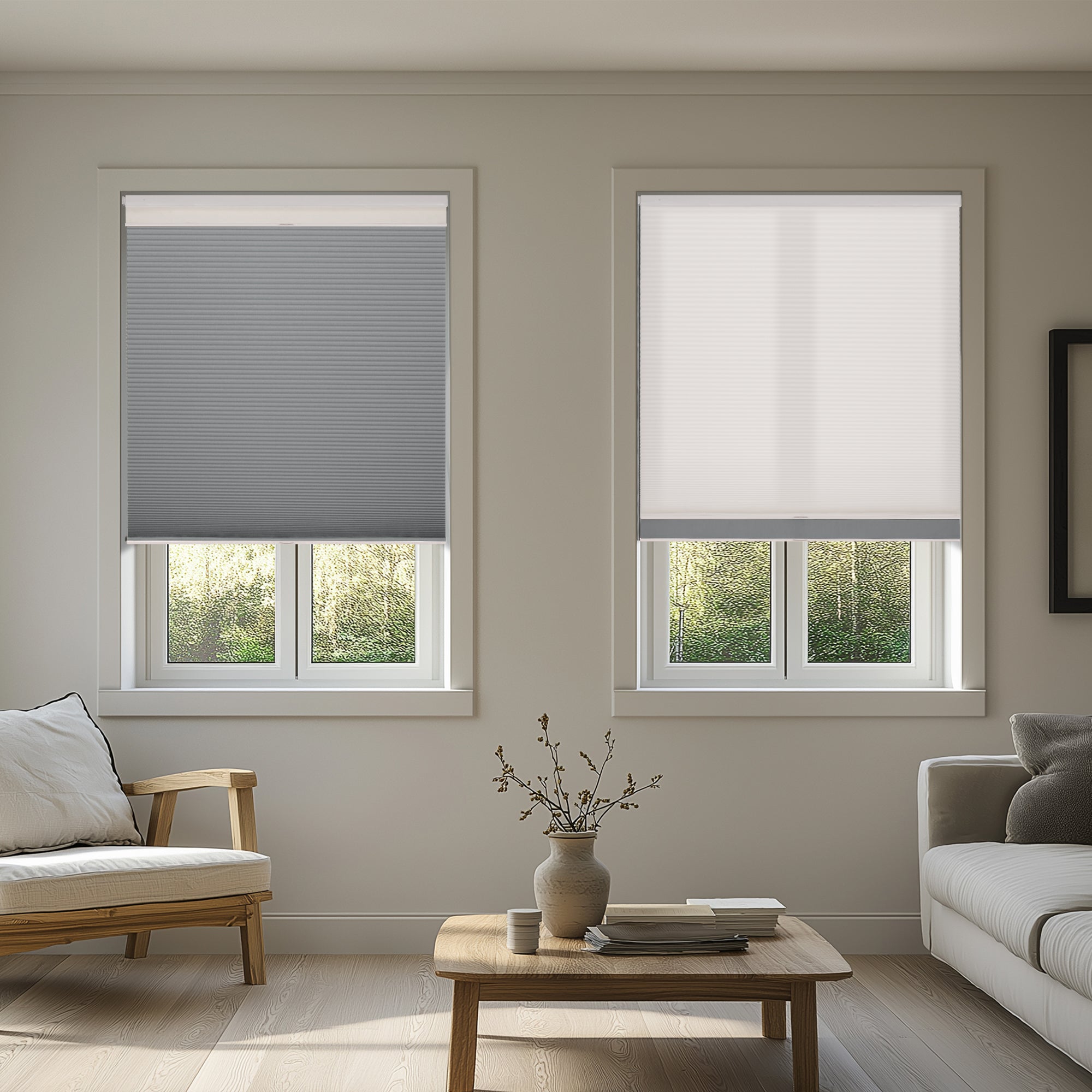 no drill day and night cellular shades with blackout shade lowered on one window and light filtering shade lowered on another window in a living room | hestia blinds
