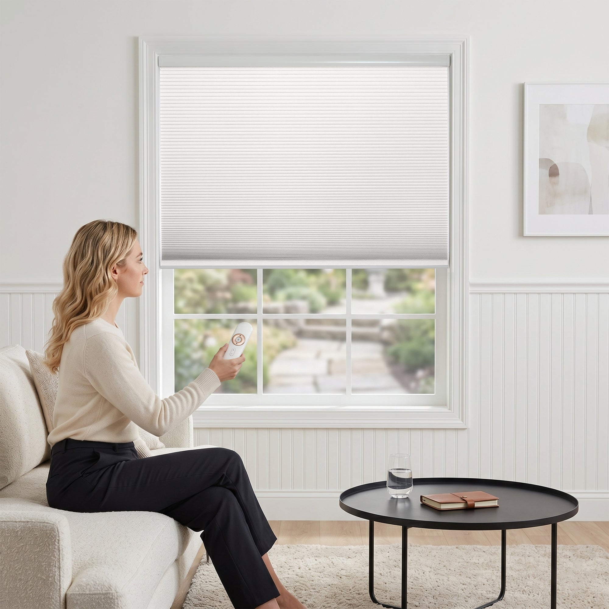 motorized cellular shades in a bright, serene living room with effortless light control | hestia blinds