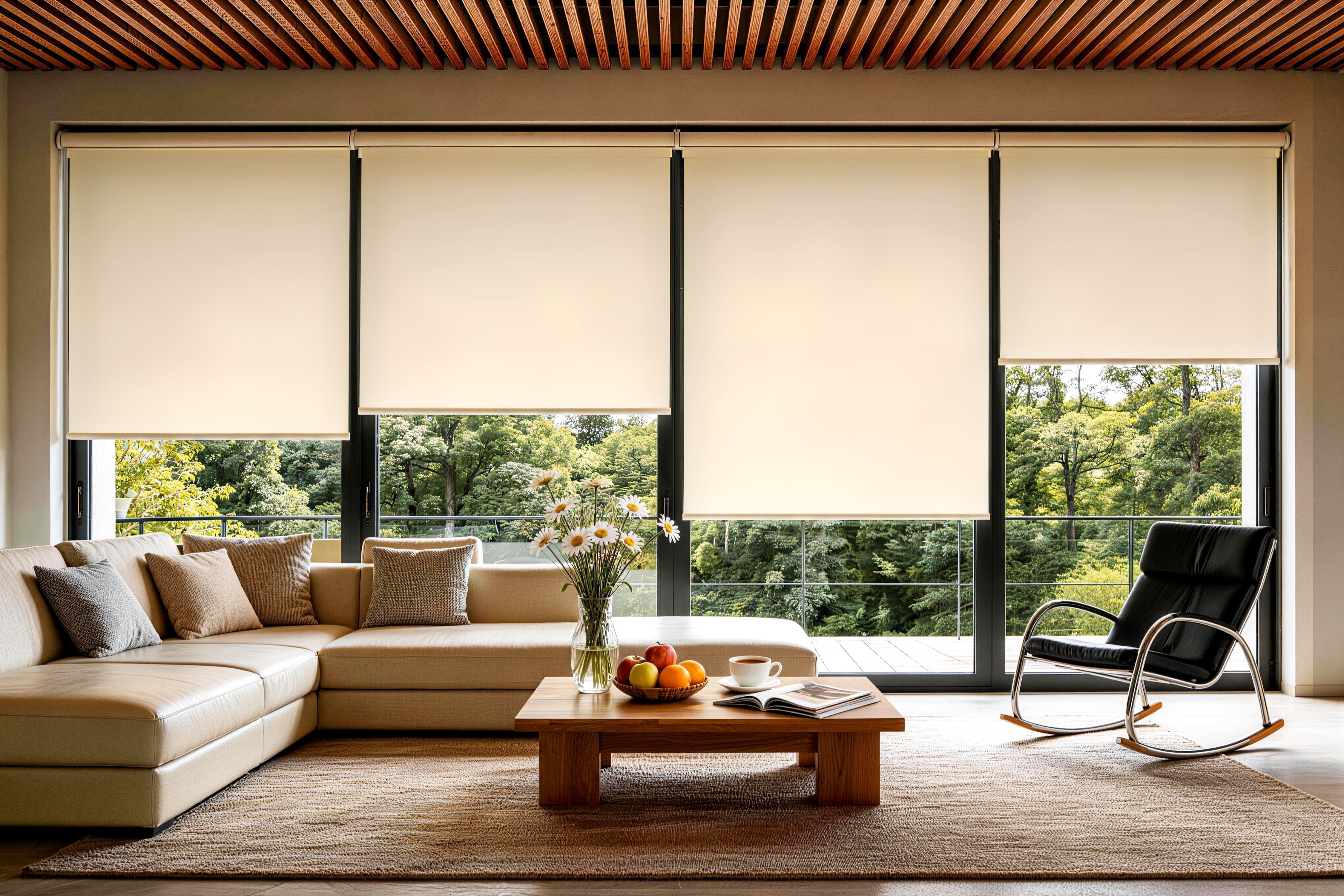 a living room featuring four cream cordless roller shades installed side-by-side to cover a large expansive window wall