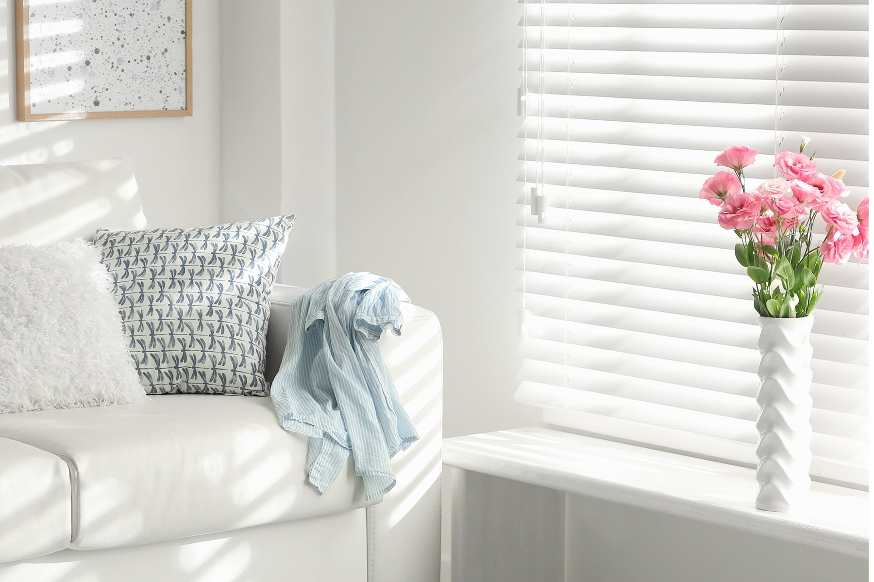 white mini blinds for indoor windows providing a refreshing ambiance