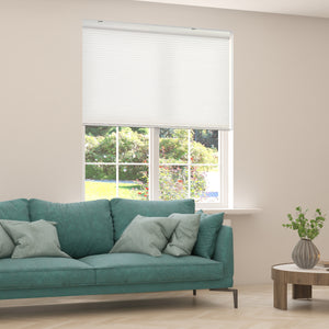 cordless light filtering cellular shades in a living room window