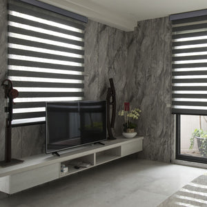 motorized blackout zebra shades in a large window