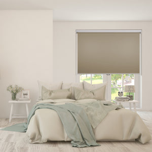 custom cordless free-stop blackout roller shades in a bedroom