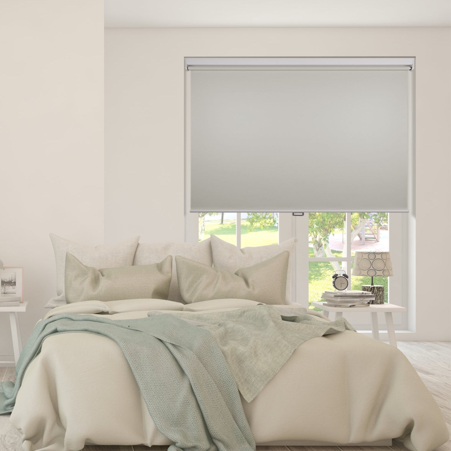 custom cordless free-stop blackout roller shades in a bedroom