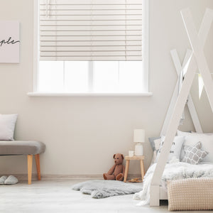 cordless ventilation waterproof faux wood blinds in a bedroom