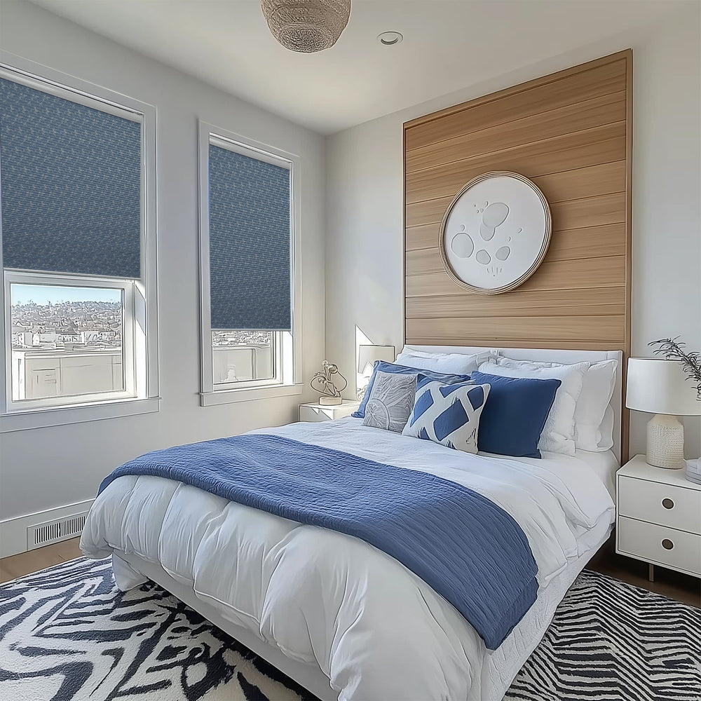 motorized blackout cellular shades in a bedroom