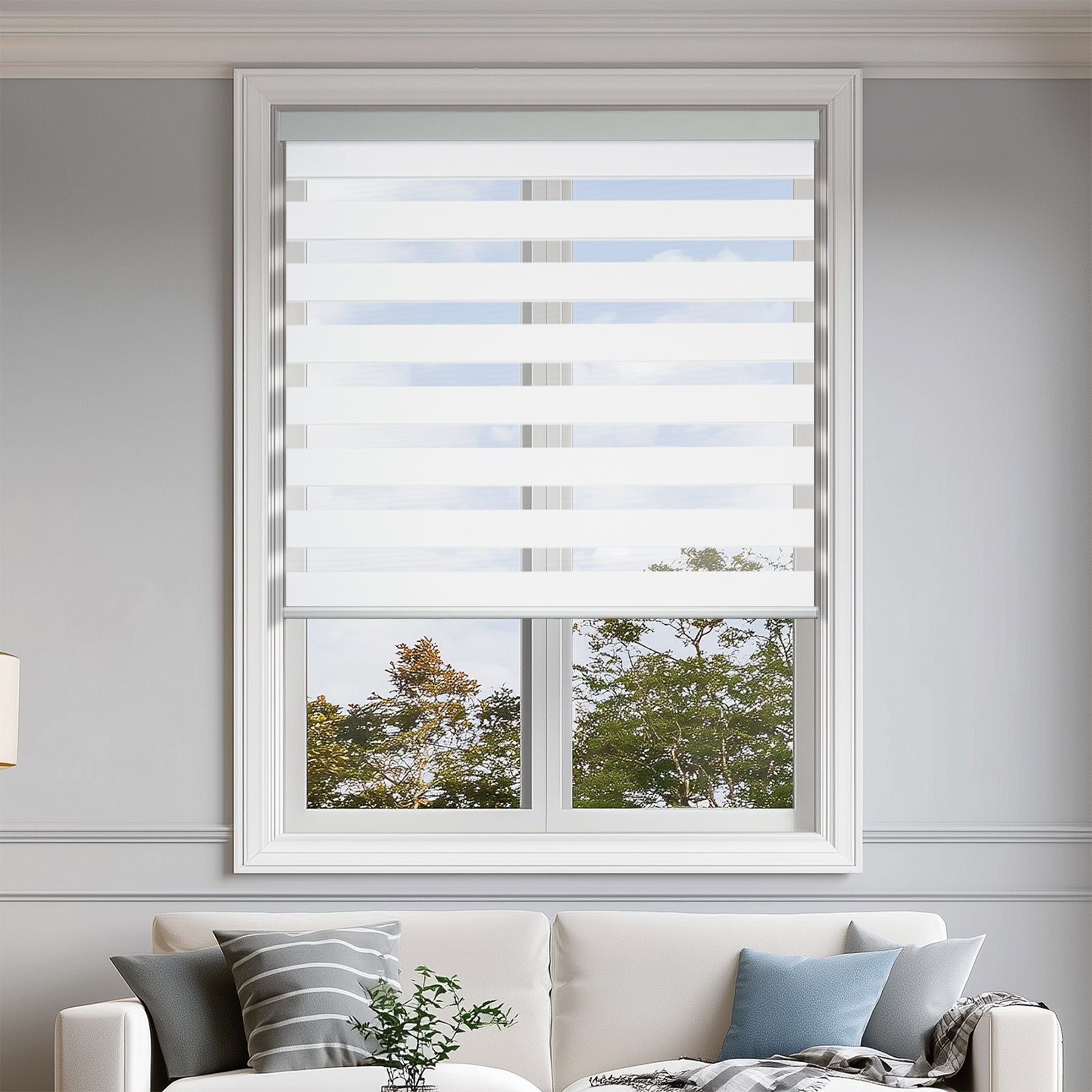 room darkening privacy protection zebra shades in a living room