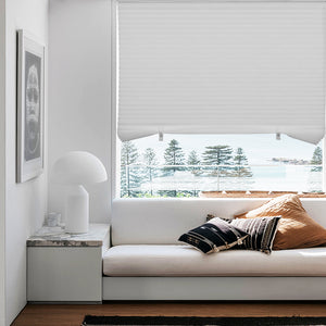 no-drill light filtering pleated paper shades in a living room