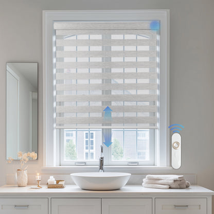 motorized light filtering linen-like bathroom zebra shades in a bathroom