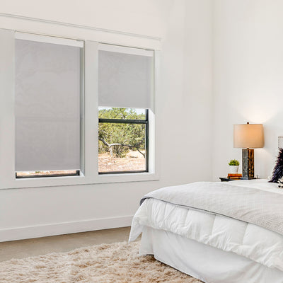 motorized light filtering waterproof kitchen roller shades in a bedroom