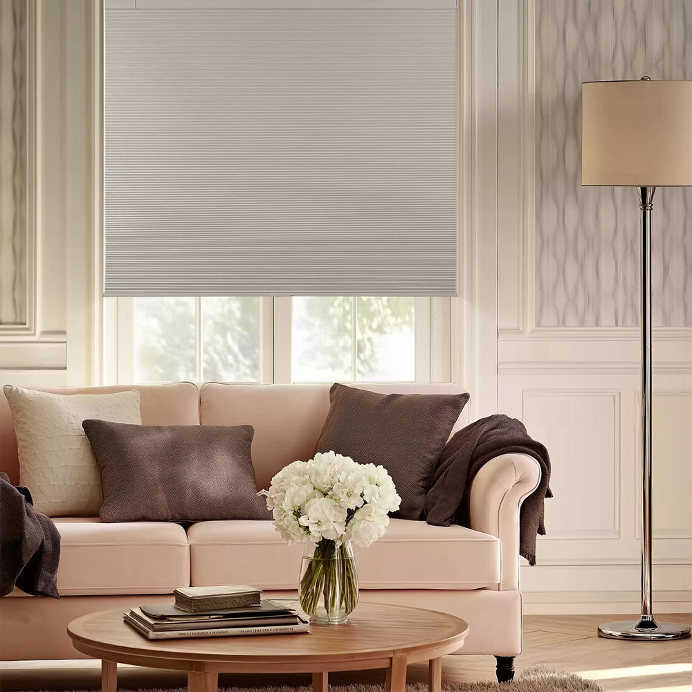 1" cordless no-drill blackout cellular shades in a living room