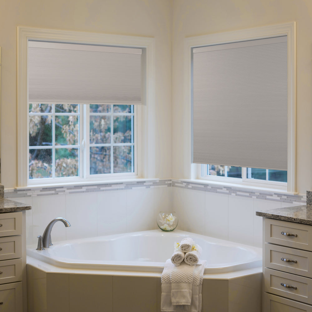 cordless blackout cellular shades for indoor windows in a large bathroom