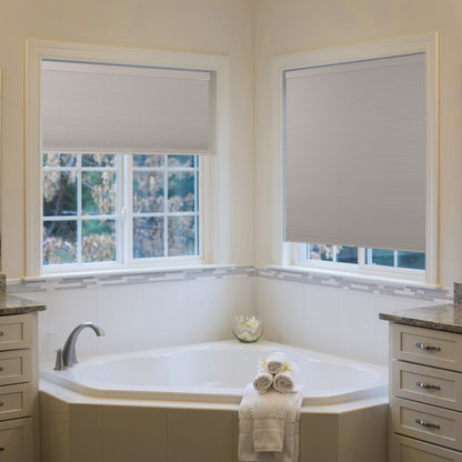 blackout thermal insulated cellular shades in a large bathroom