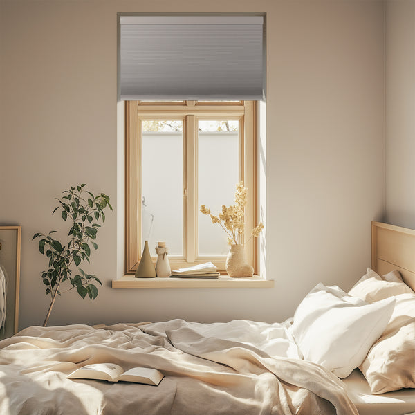 cordless blackout cellular shades for indoor windows in a bedroom