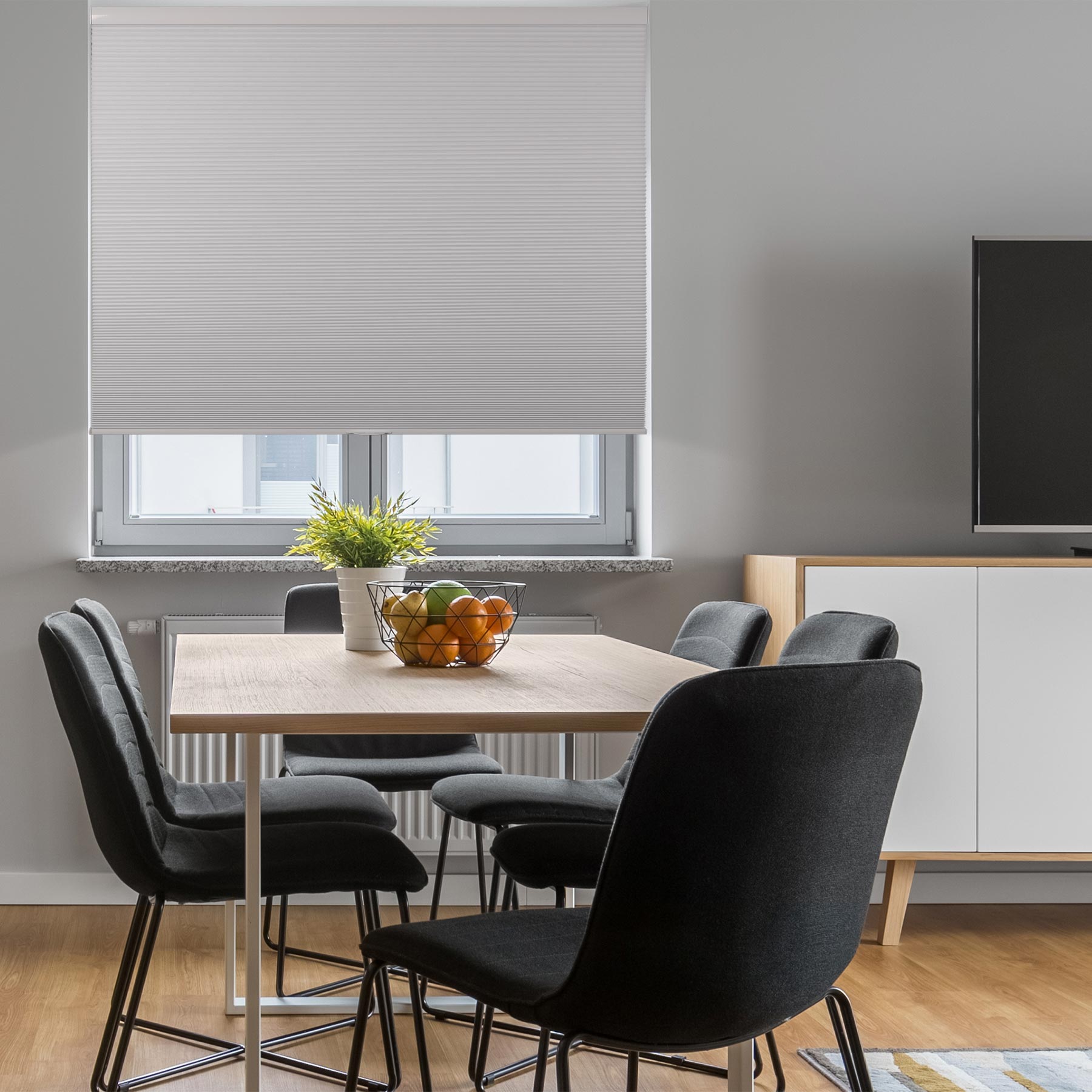 cordless blackout cellular shades for indoor windows in a dining room