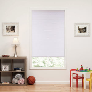 cordless light filtering cellular shades for indoor windows in a living room