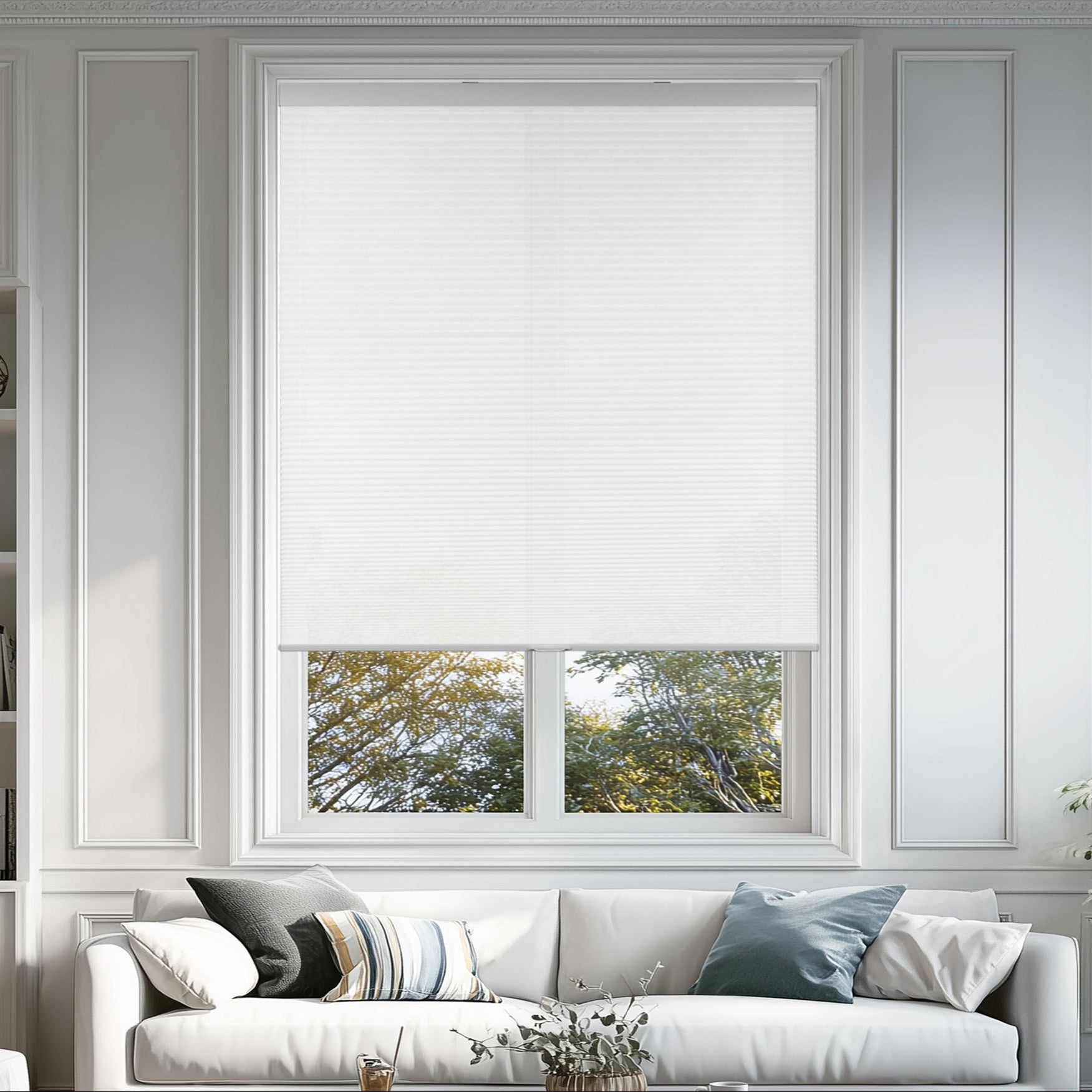 cordless light filtering cellular shades for indoor windows in a living room