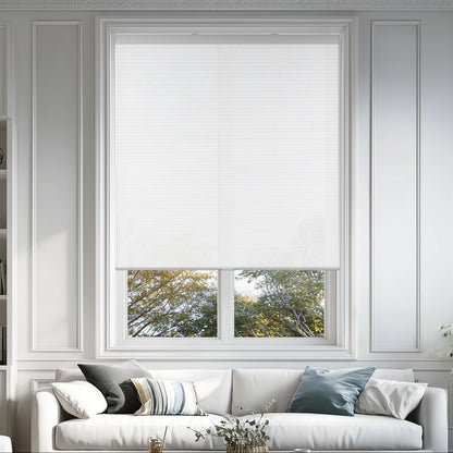 cordless light filtering cellular shades for indoor windows in a living room