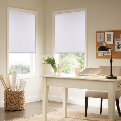 cordless no-drill light filtering cellular shades in a study room