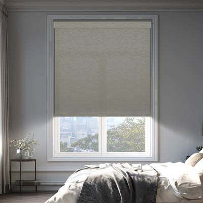 light filtering natural linen enhanced privacy roller shades in a bedroom