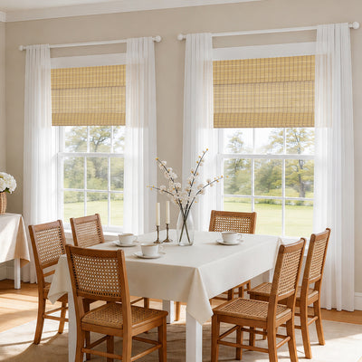 natural bamboo woven wood shades in a sunlit dining space with layered sheers and a light, inviting farmhouse-modern ambiance | Hestia Blinds