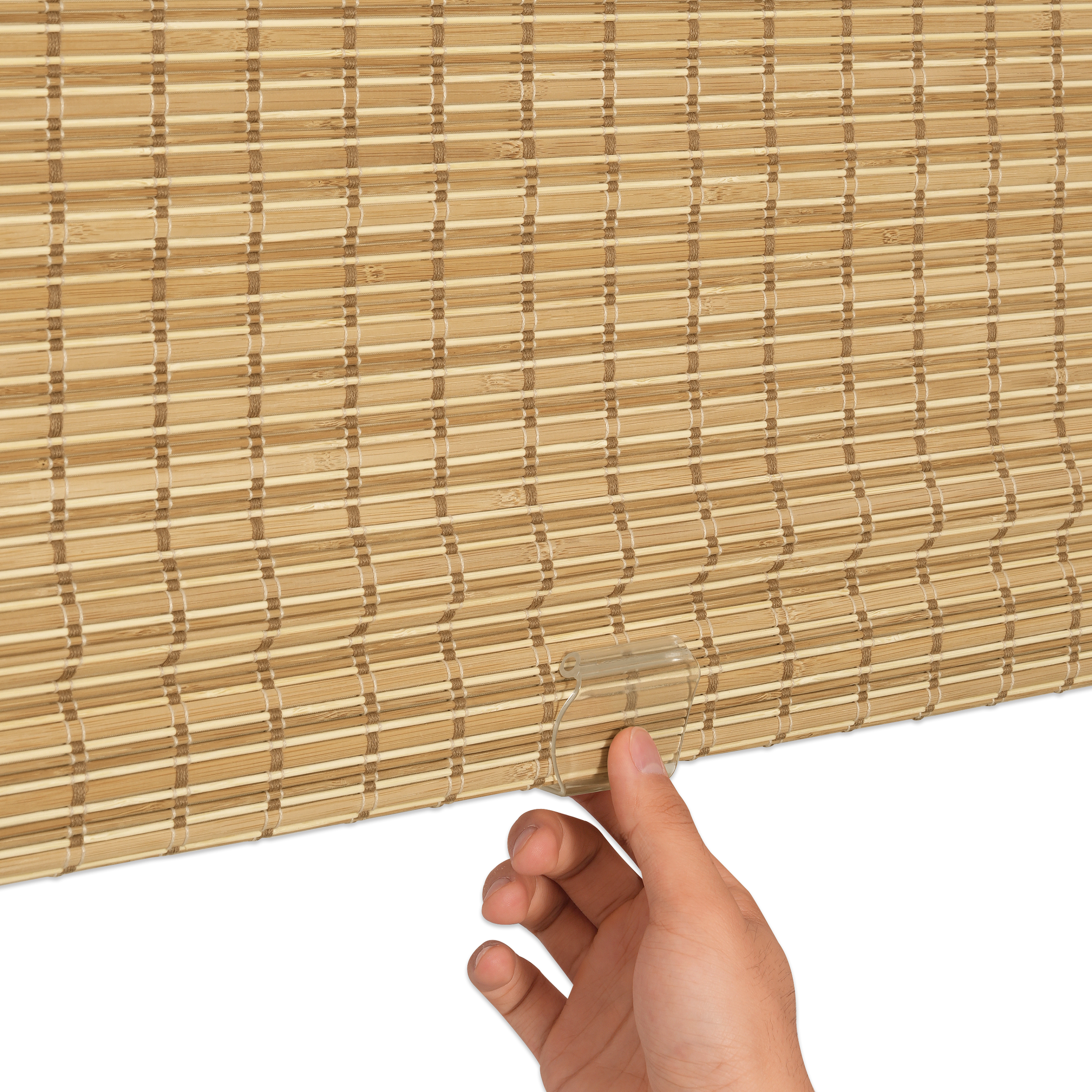 natural bamboo woven wood shades bottom rail detail showing centered handle and child-safe cordless design | Hestia Blinds