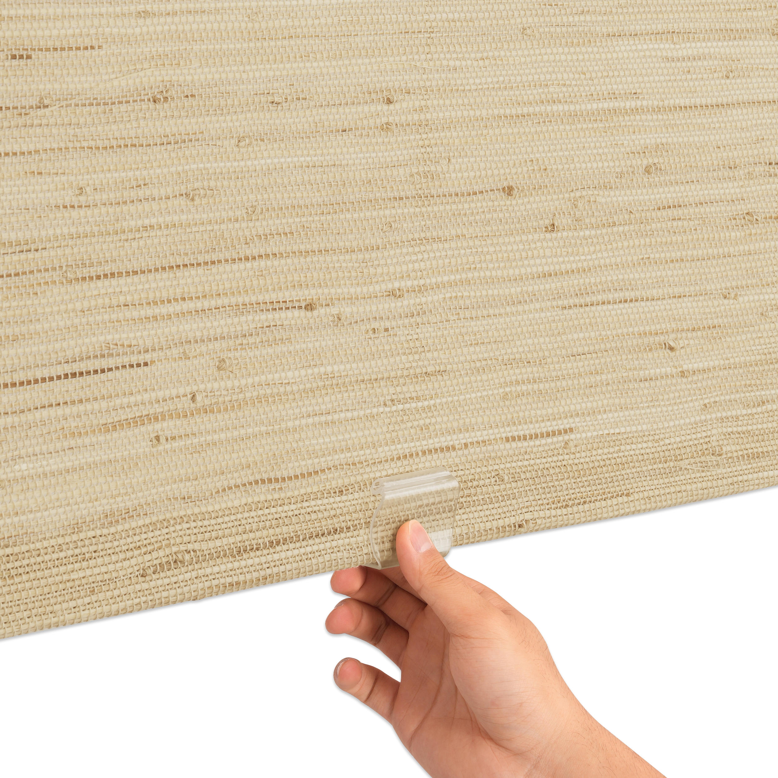 natural 100% ramie woven shades bottom rail detail highlighting discreet clear handle and fabric-wrapped finish with cordless design for safer, child and pet friendly use | Hestia Blinds
